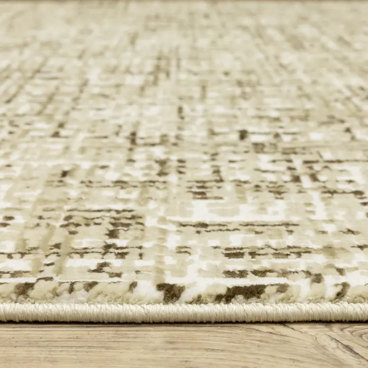 7' X 10' Ivory And Brown Abstract Area Rug