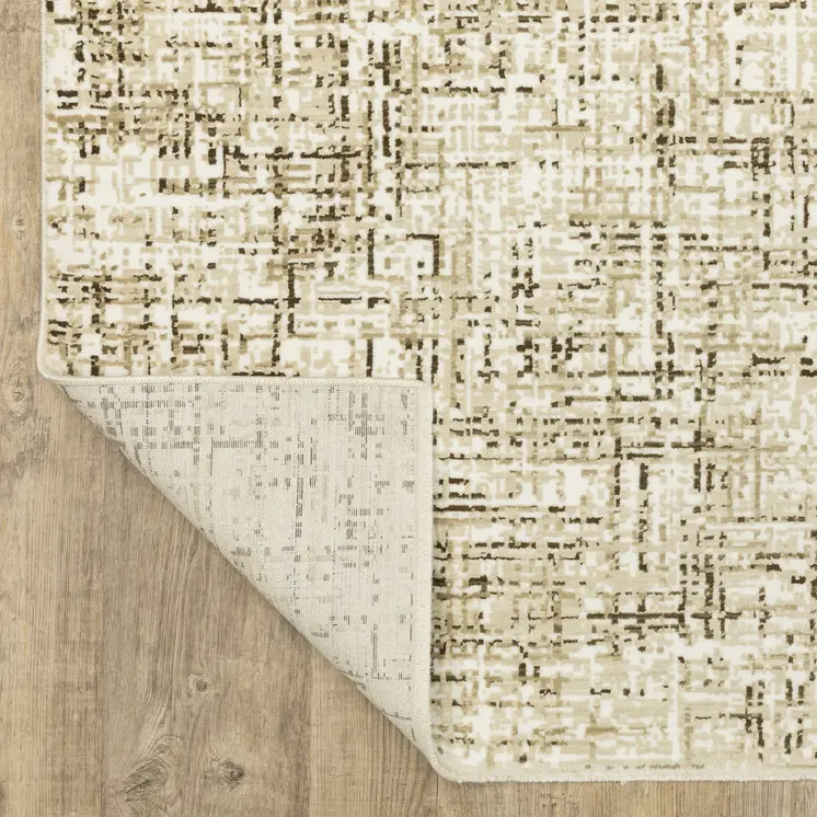 7' X 10' Ivory And Brown Abstract Area Rug