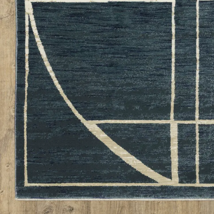 7' X 10' Blue And Ivory Geometric Area Rug