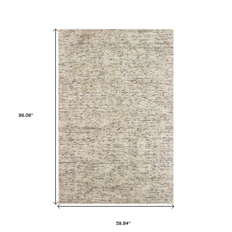 5' X 8' Ivory And Sand Hand Tufted Area Rug