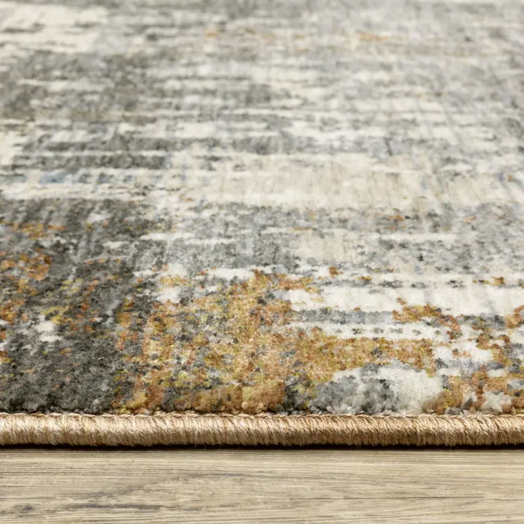 7' X 10' Gray And Gold Abstract Area Rug With Fringe