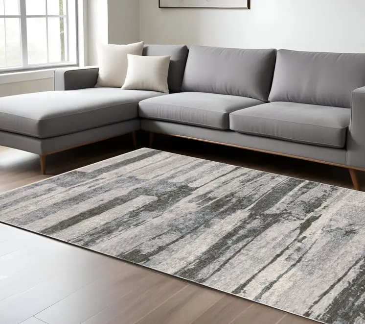 7' X 10' Gray And Ivory Abstract Area Rug With Fringe
