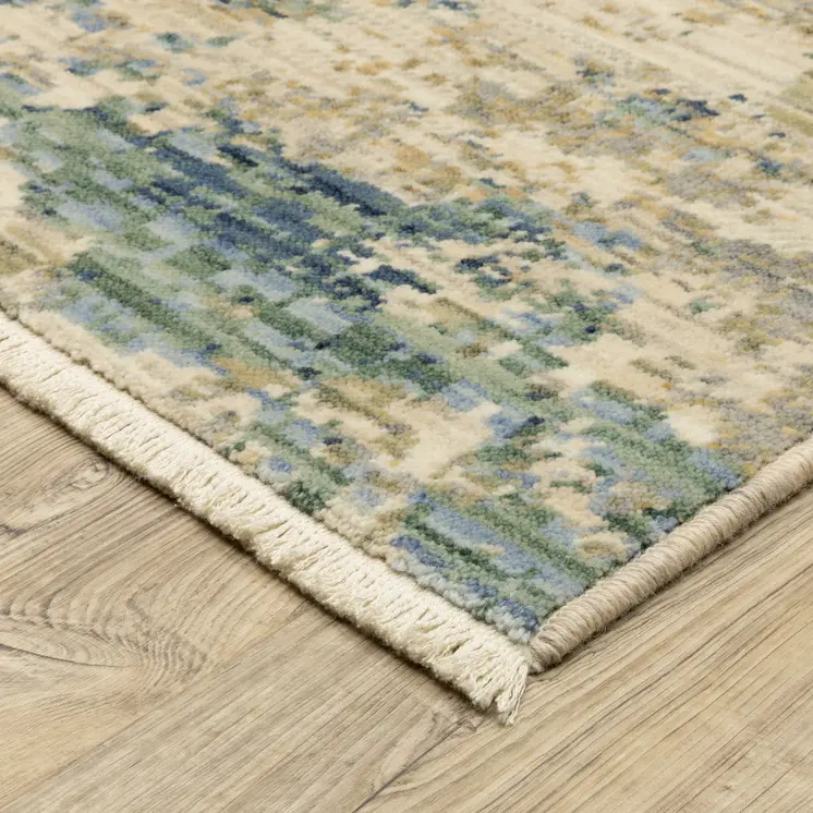 7' X 10' Beige And Blue Abstract Area Rug With Fringe