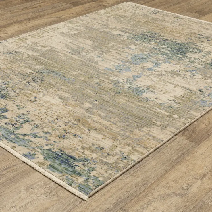 7' X 10' Beige And Blue Abstract Area Rug With Fringe