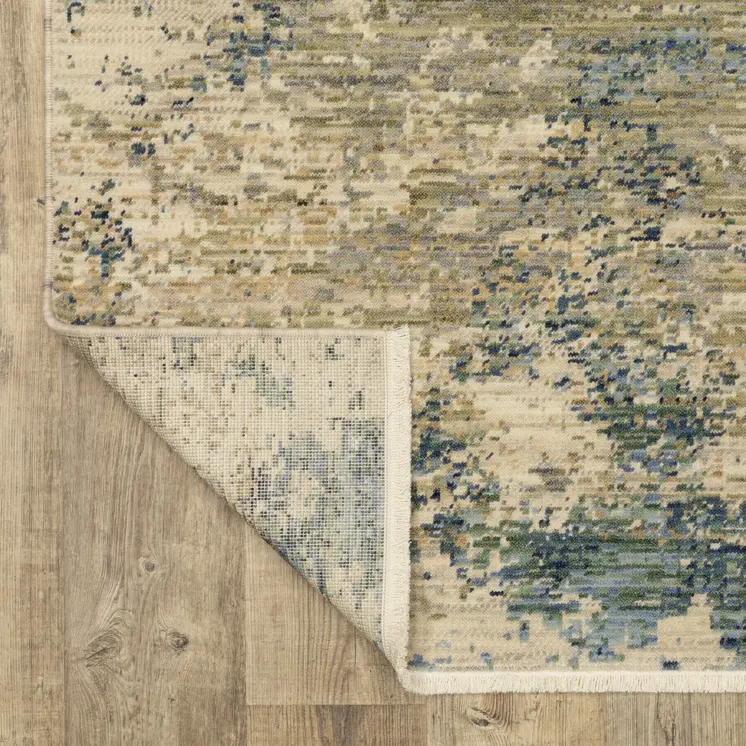 7' X 10' Beige And Blue Abstract Area Rug With Fringe