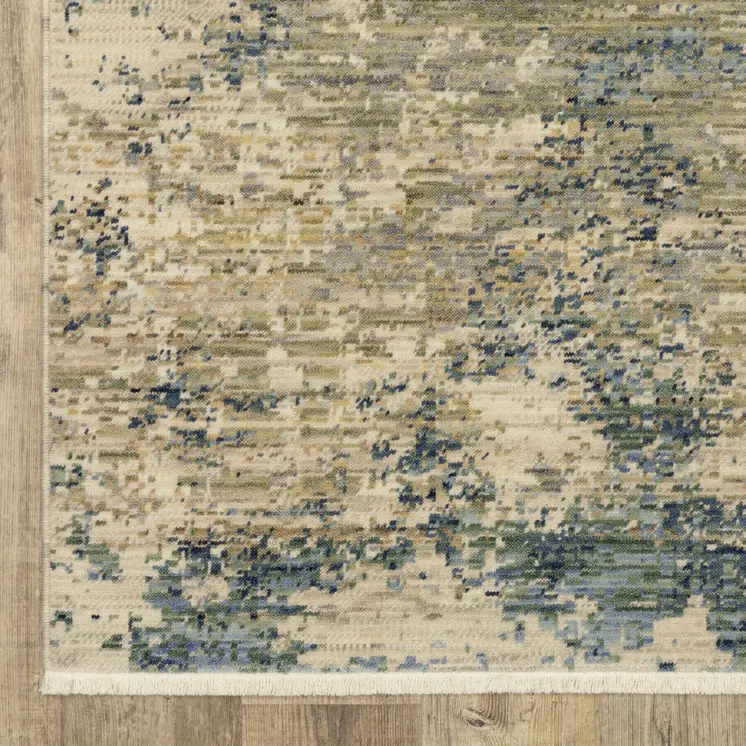 7' X 10' Beige And Blue Abstract Area Rug With Fringe