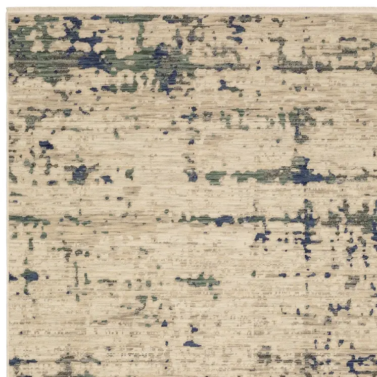 7' X 10' Beige And Green Abstract Area Rug With Fringe
