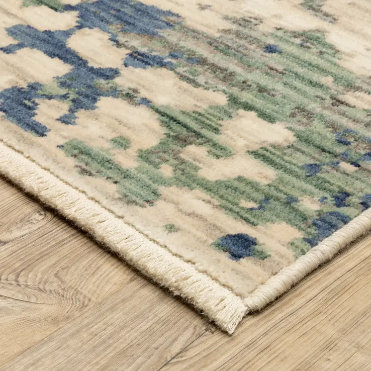 7' X 10' Beige And Green Abstract Area Rug With Fringe