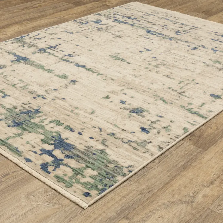 7' X 10' Beige And Green Abstract Area Rug With Fringe