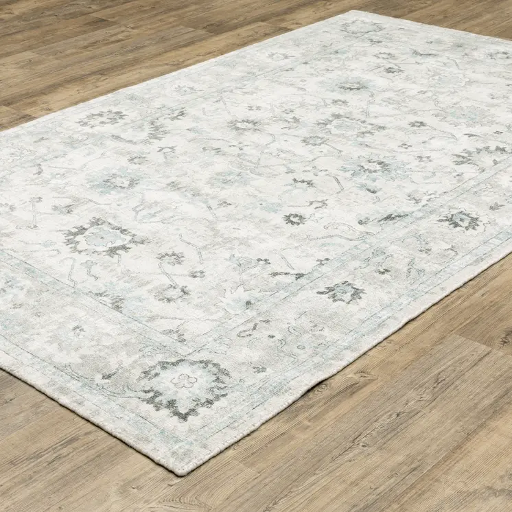 6' X 9' Ivory And Teal Blue Oriental Hand Tufted Area Rug
