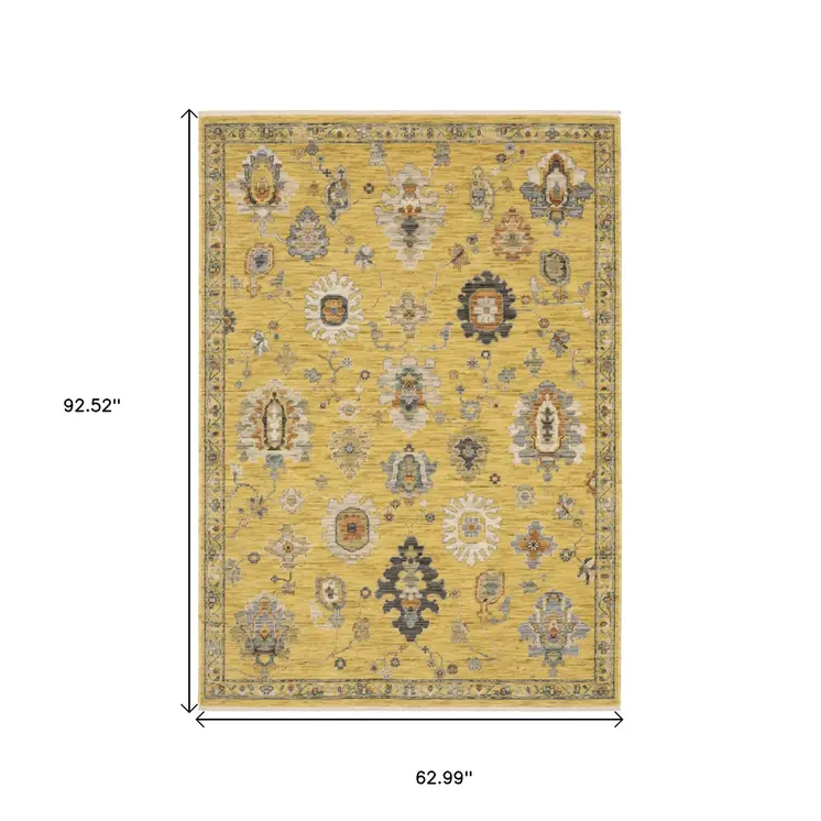 5' X 8' Yellow Gray And Black Oriental Area Rug With Fringe