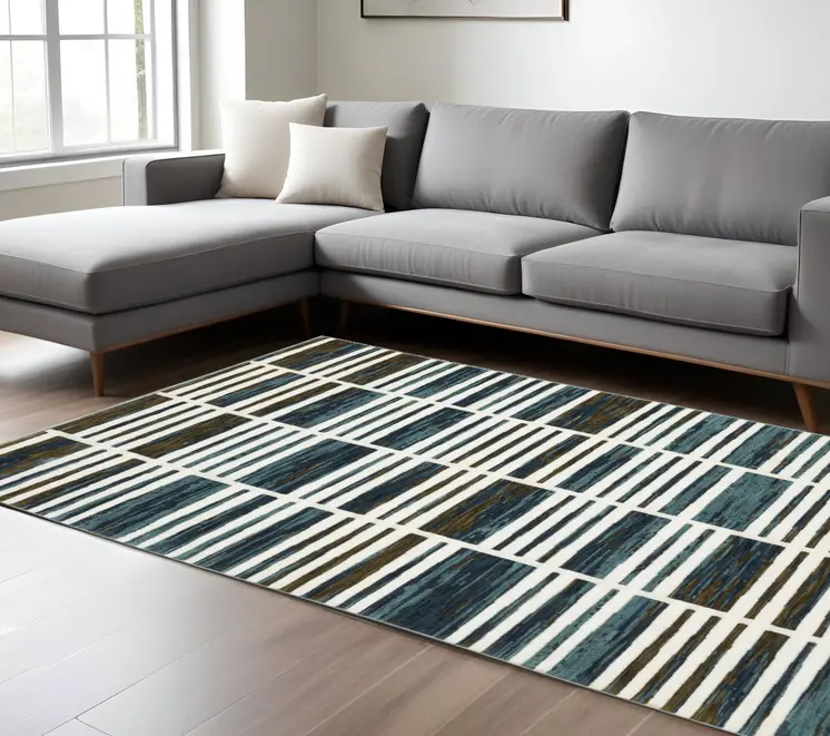 8' X 11' Ivory And Blue Geometric Area Rug