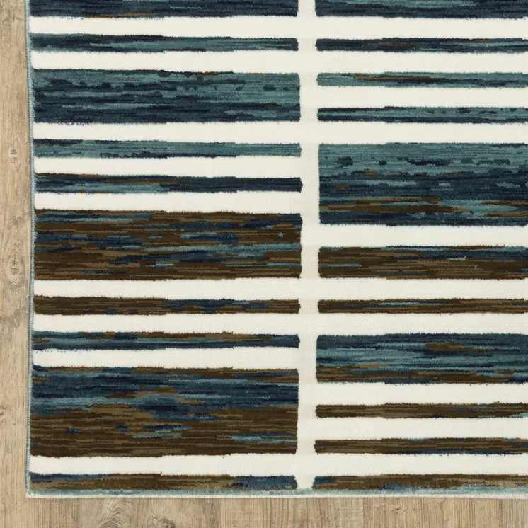 8' X 11' Ivory And Blue Geometric Area Rug
