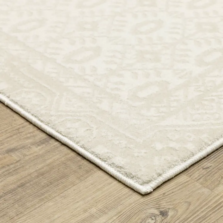 8' X 11' Ivory And Beige Medallion Area Rug