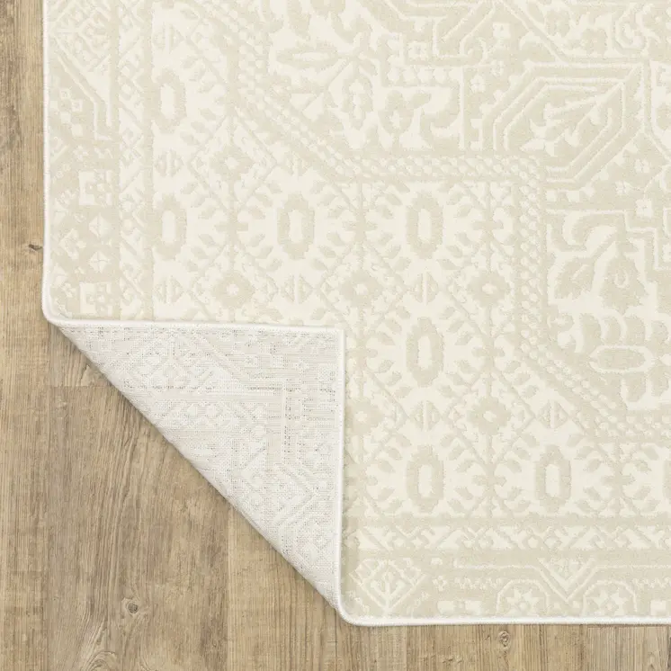 8' X 11' Ivory And Beige Medallion Area Rug
