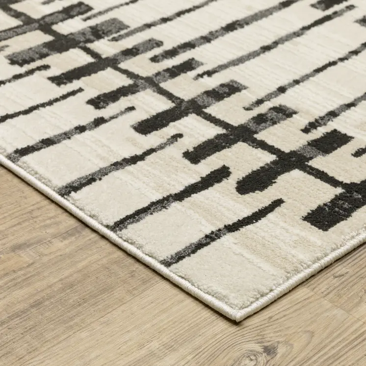 8' X 11' Beige And Black Geometric Area Rug