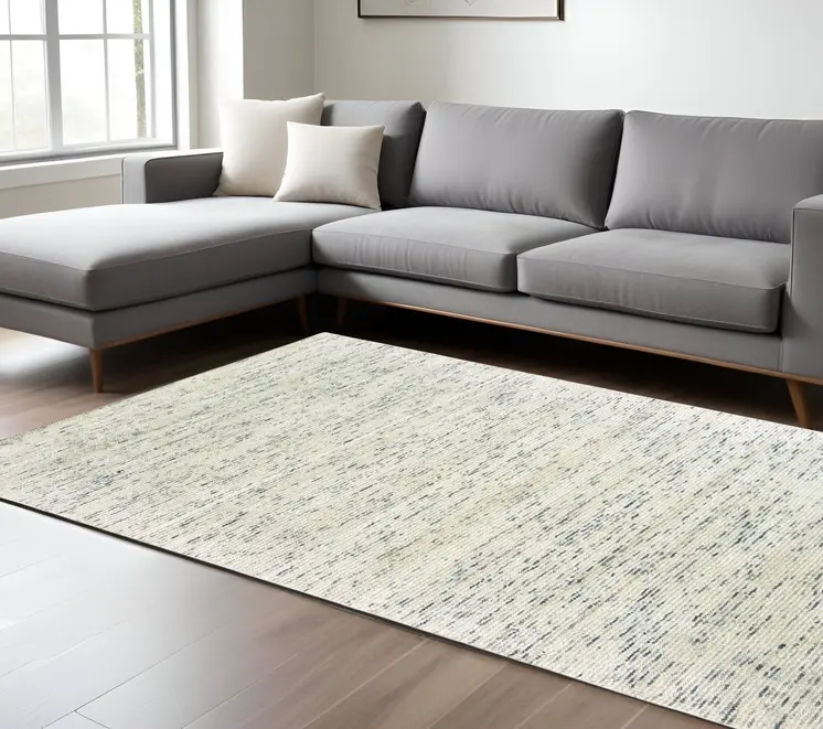 8' X 10' Ivory Hand Tufted Area Rug