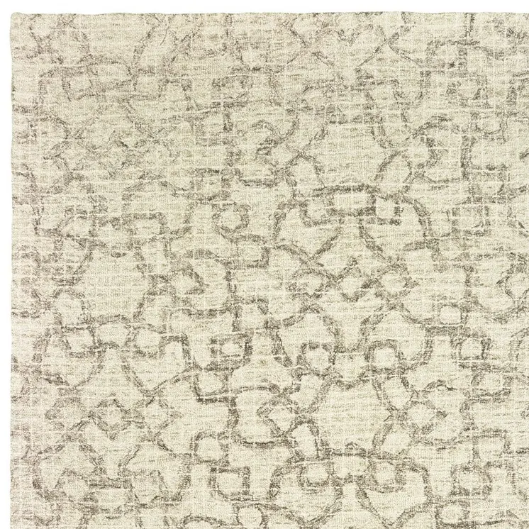 10' X 13' Tan And Ivory Wool Geometric Hand Tufted Area Rug