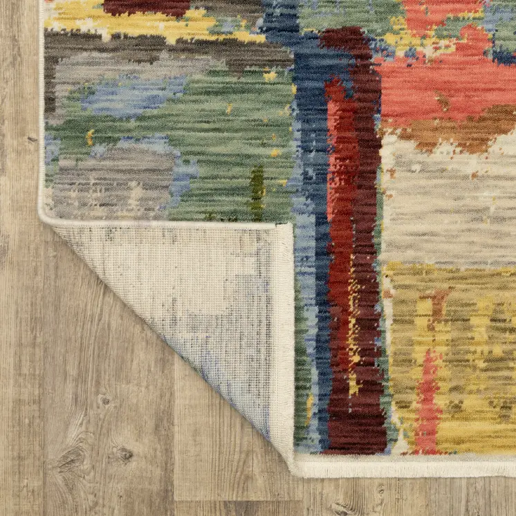 10' X 13' Pink Red And Yellow Abstract Area Rug With Fringe