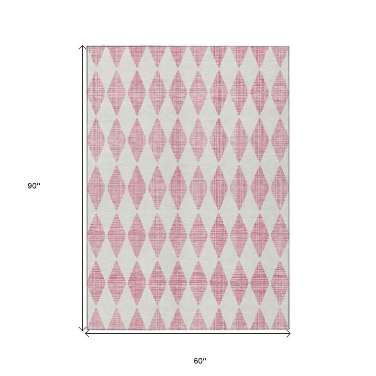 5' X 8' Pink And Ivory Geometric Washable Indoor Outdoor Area Rug