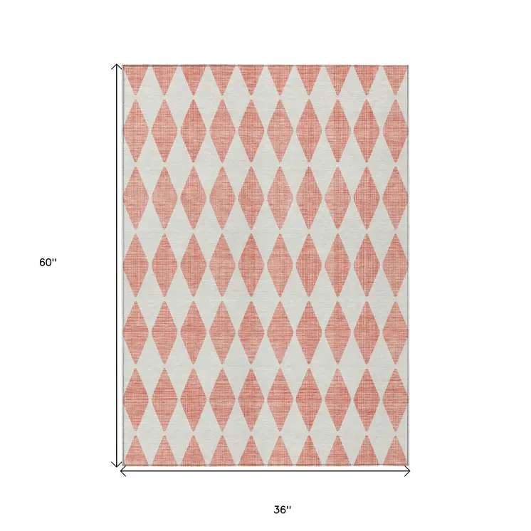 3' X 5' Salmon And Ivory Geometric Washable Indoor Outdoor Area Rug
