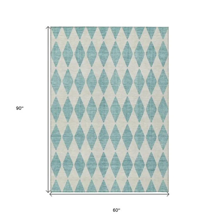5' X 8' Teal Blue And Ivory Geometric Washable Indoor Outdoor Area Rug