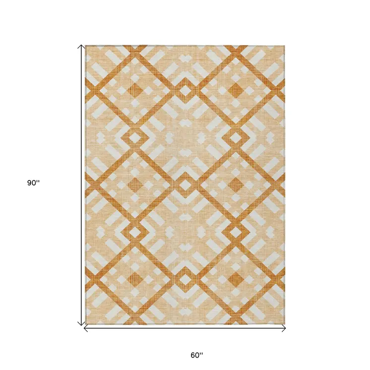 5' X 8' Peach Orange And Ivory Geometric Washable Indoor Outdoor Area Rug