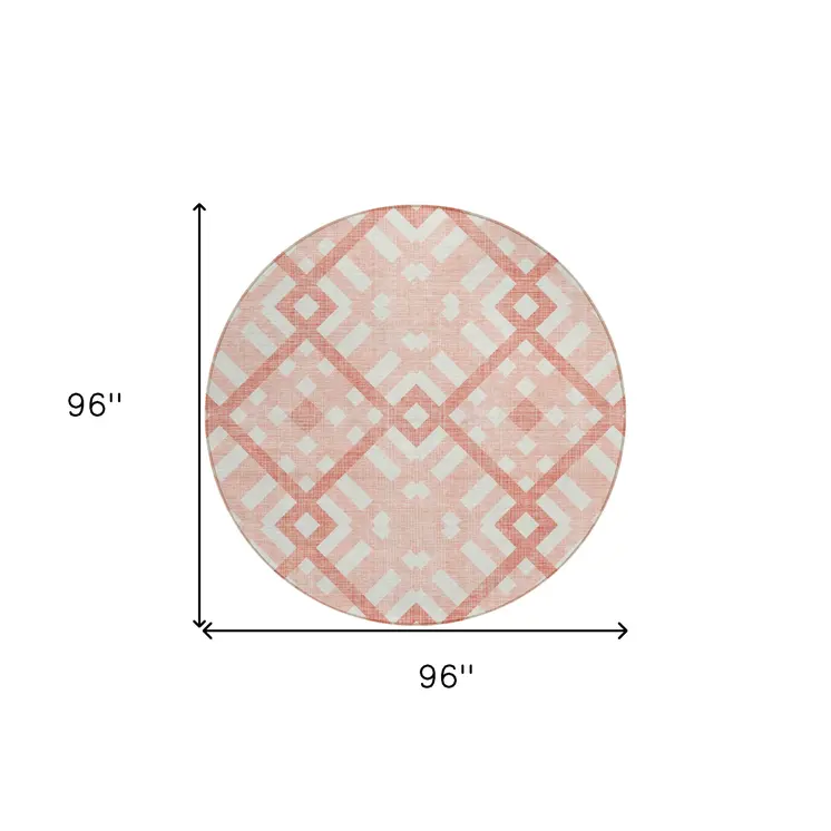 8' Salmon Peach And Ivory Round Geometric Washable Indoor Outdoor Area Rug
