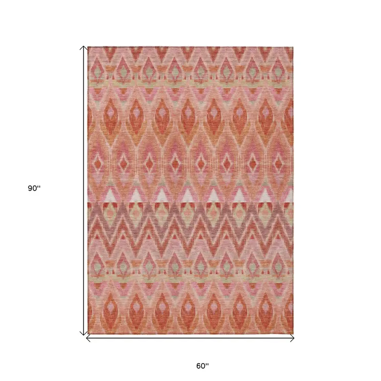 5' X 8' Pink Salmon And Blush Southwestern Washable Indoor Outdoor Area Rug