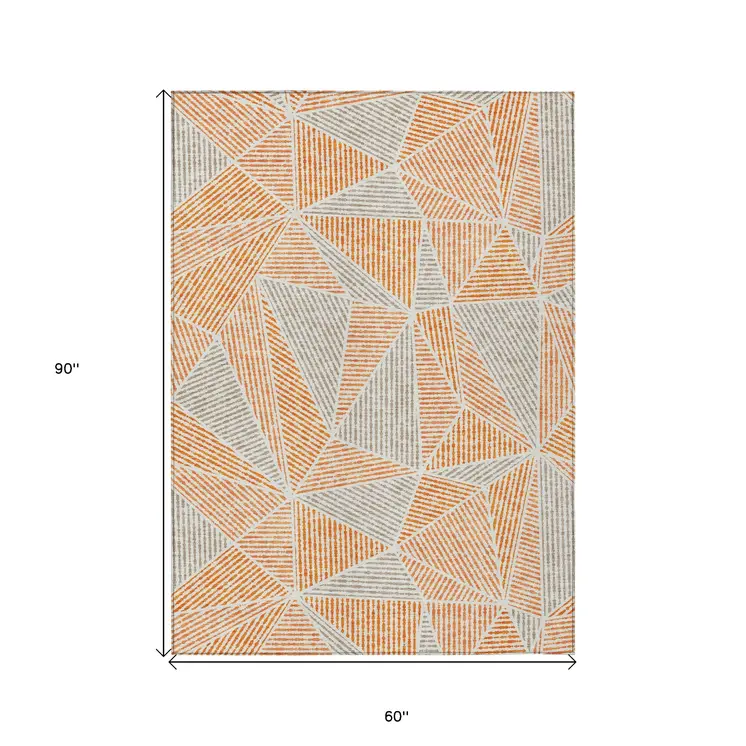 5' X 8' Orange Gray And Silver Geometric Washable Indoor Outdoor Area Rug