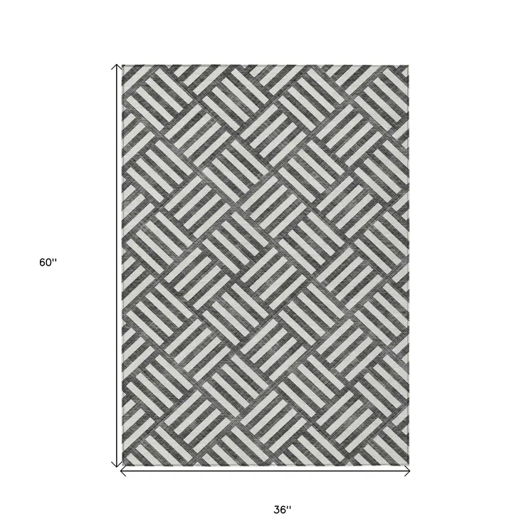3' X 5' Black And Ivory Geometric Washable Indoor Outdoor Area Rug