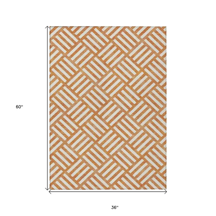 3' X 5' Orange And Ivory Geometric Washable Indoor Outdoor Area Rug