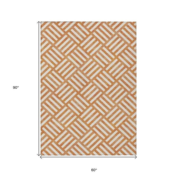 5' X 8' Orange And Ivory Geometric Washable Indoor Outdoor Area Rug
