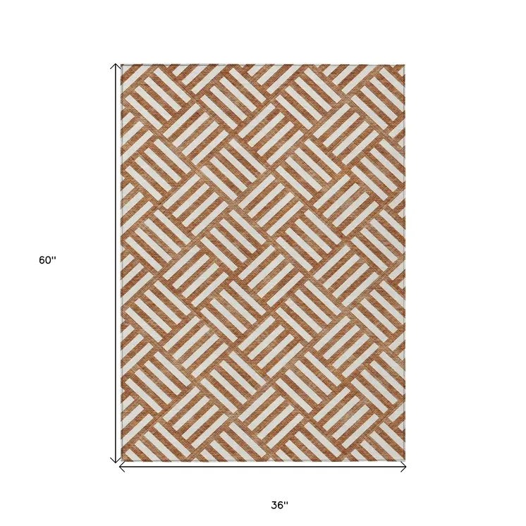 3' X 5' Orange And Ivory Geometric Washable Indoor Outdoor Area Rug