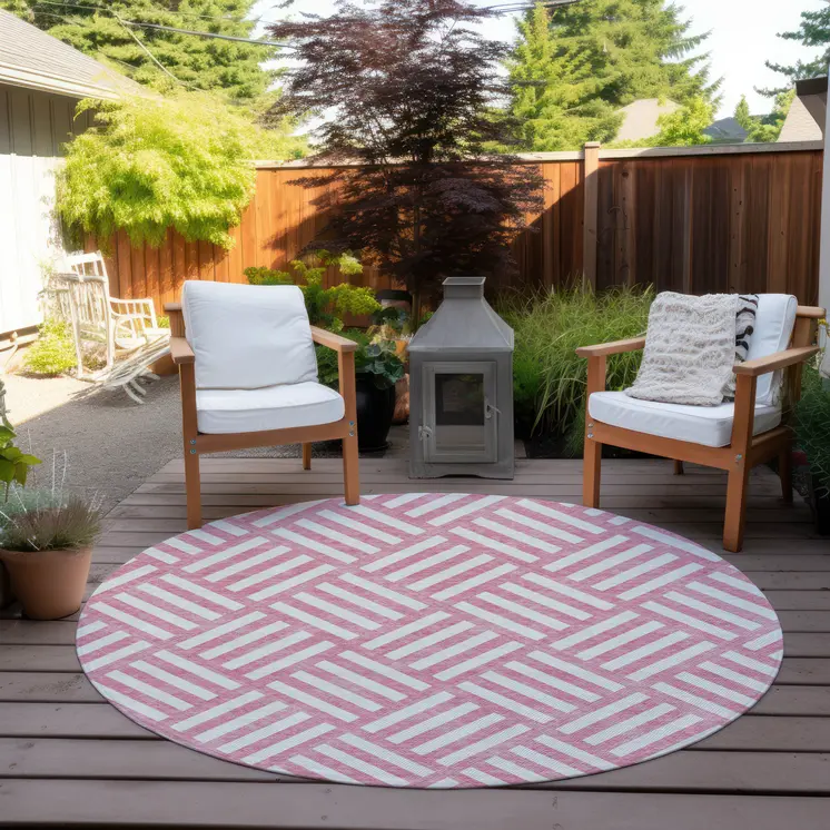 8' Pink And Ivory Round Geometric Washable Indoor Outdoor Area Rug