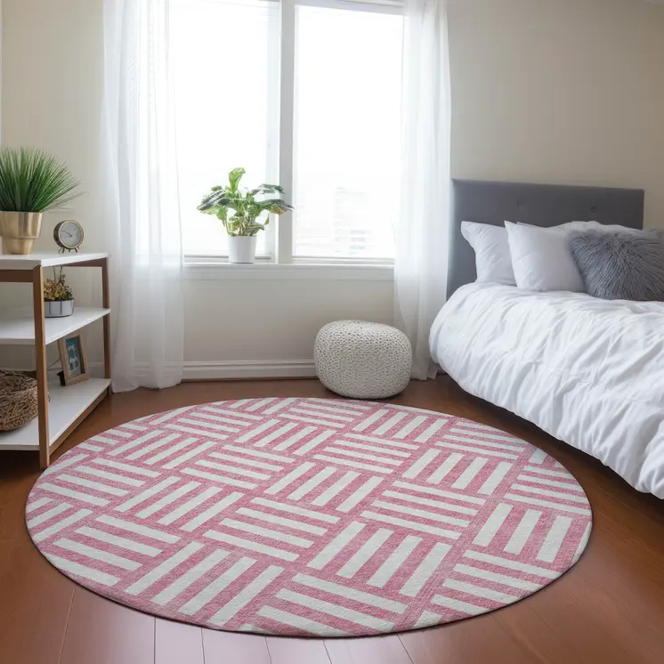 8' Pink And Ivory Round Geometric Washable Indoor Outdoor Area Rug