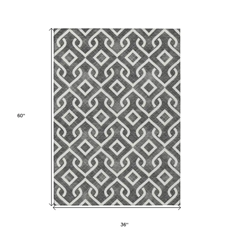 3' X 5' Black And Ivory Geometric Washable Indoor Outdoor Area Rug