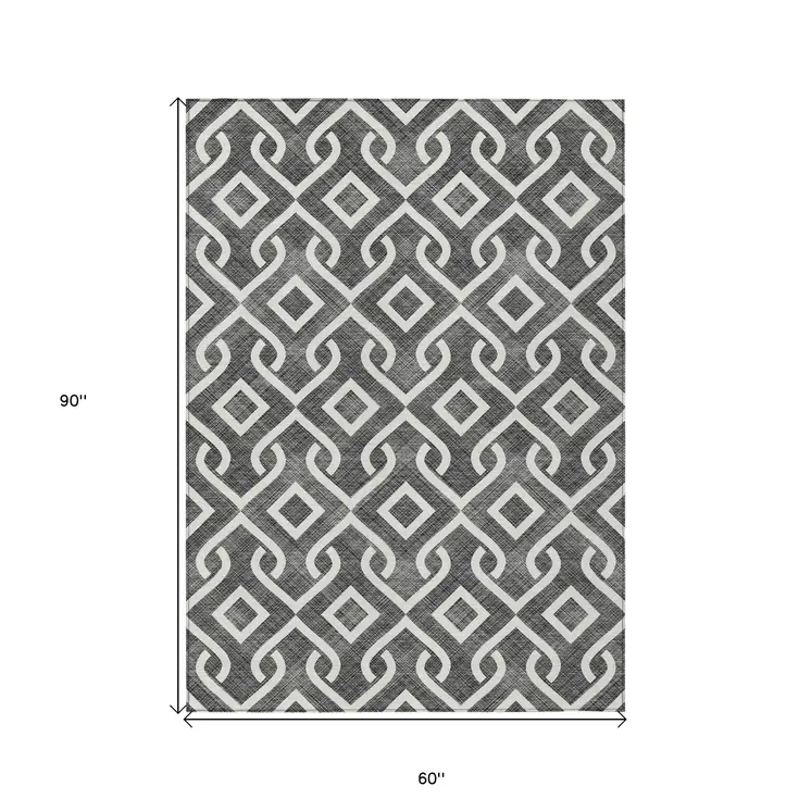 5' X 8' Black And Ivory Geometric Washable Indoor Outdoor Area Rug