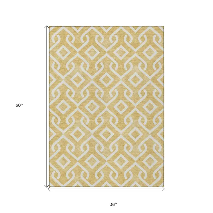 3' X 5' Gold And Ivory Geometric Washable Indoor Outdoor Area Rug