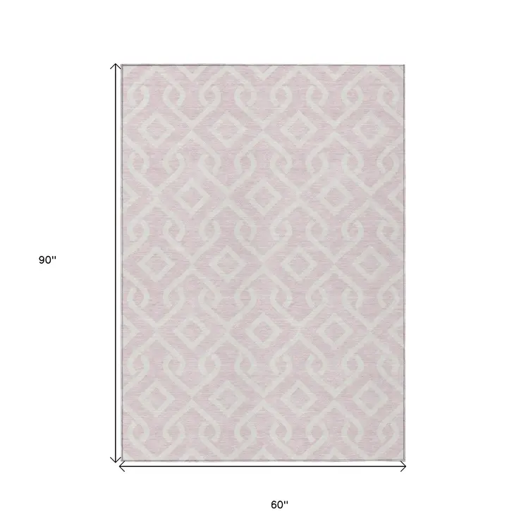 5' X 8' Pink And Ivory Geometric Washable Indoor Outdoor Area Rug