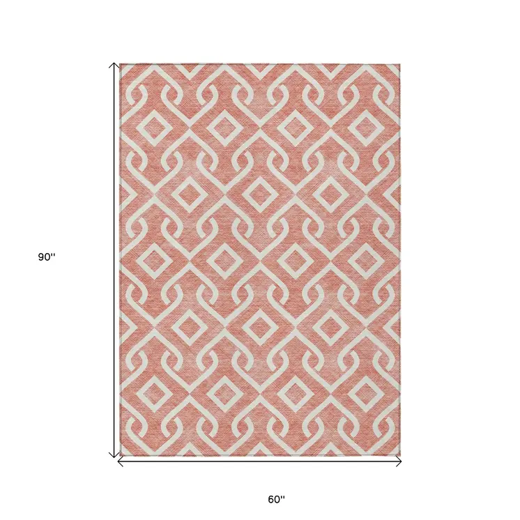 5' X 8' Salmon And Ivory Geometric Washable Indoor Outdoor Area Rug