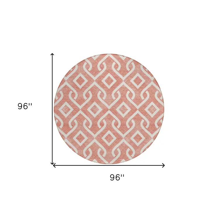 8' Salmon And Ivory Round Geometric Washable Indoor Outdoor Area Rug
