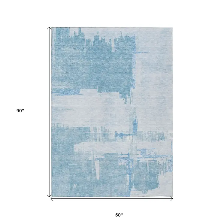 5' X 8' Sky Blue And Denim Blue Abstract Washable Indoor Outdoor Area Rug