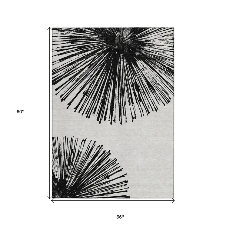 3' X 5' Black And Ivory Abstract Washable Indoor Outdoor Area Rug
