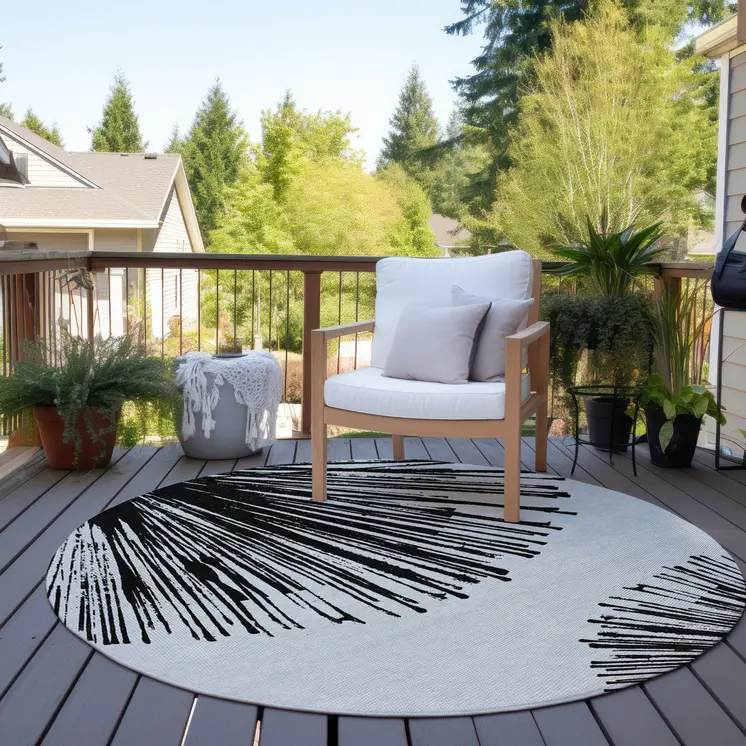 8' Black And Ivory Round Abstract Washable Indoor Outdoor Area Rug