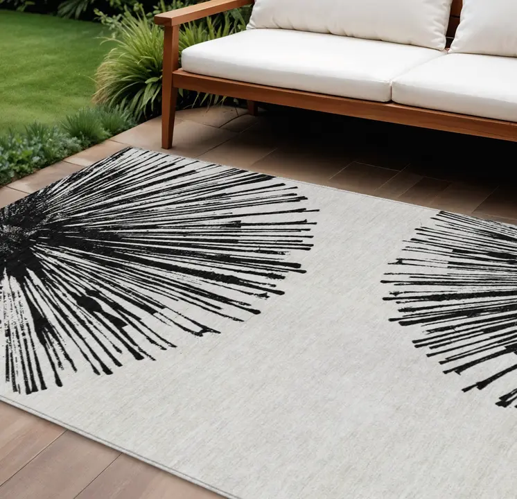 9' X 12' Black And Ivory Abstract Washable Indoor Outdoor Area Rug