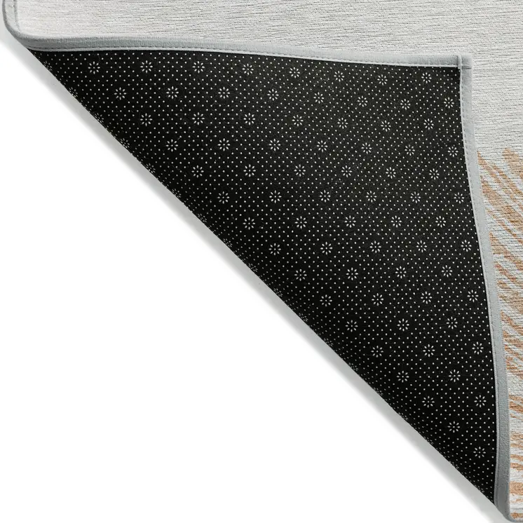 5' X 8' Salmon And Ivory Abstract Washable Indoor Outdoor Area Rug