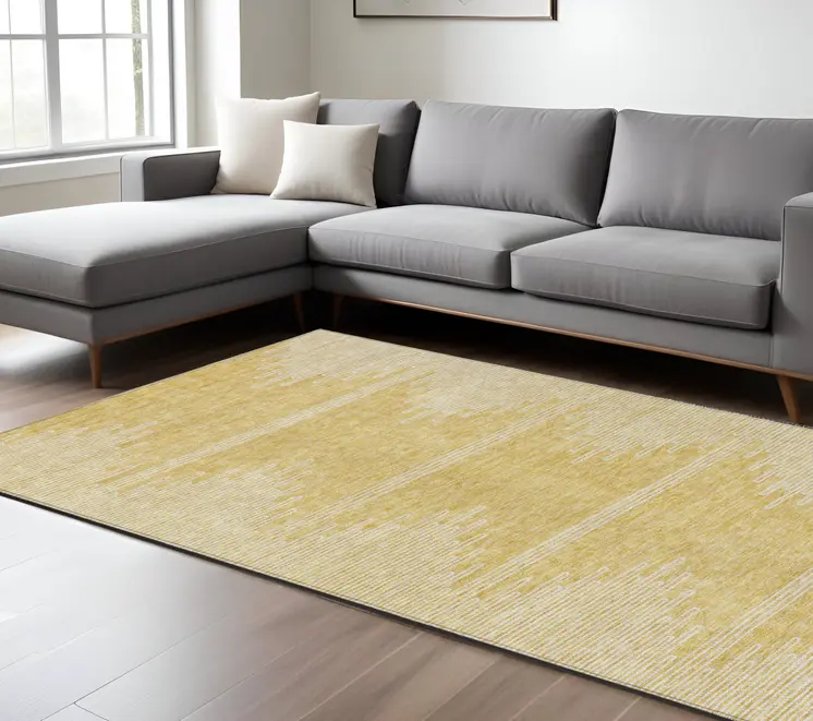 9' X 12' Gold And Ivory Abstract Washable Indoor Outdoor Area Rug
