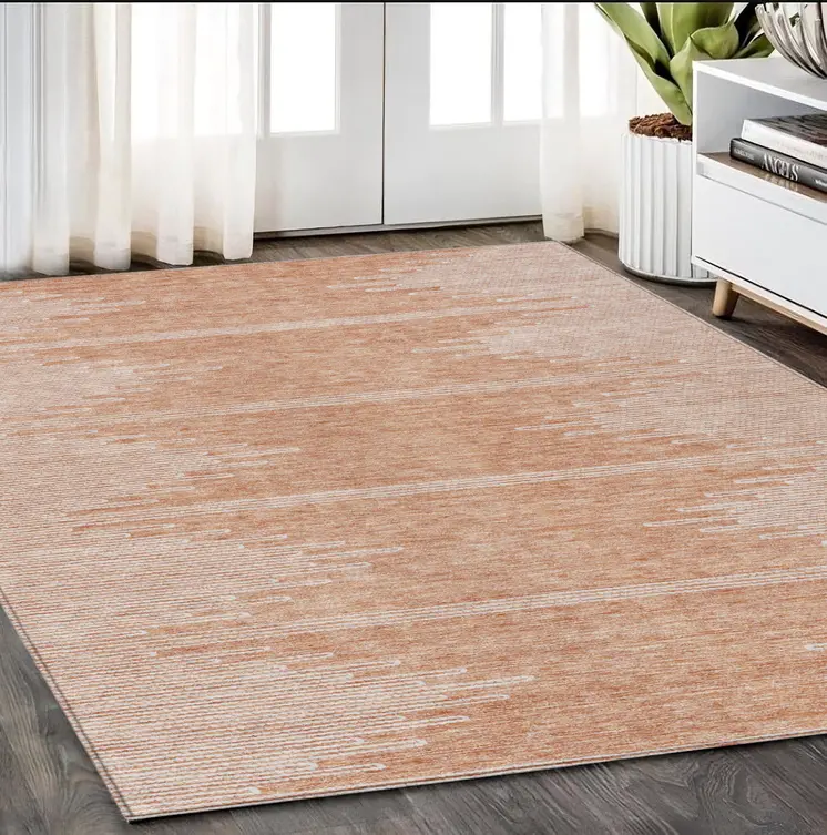 5' X 8' Salmon And Ivory Abstract Washable Indoor Outdoor Area Rug