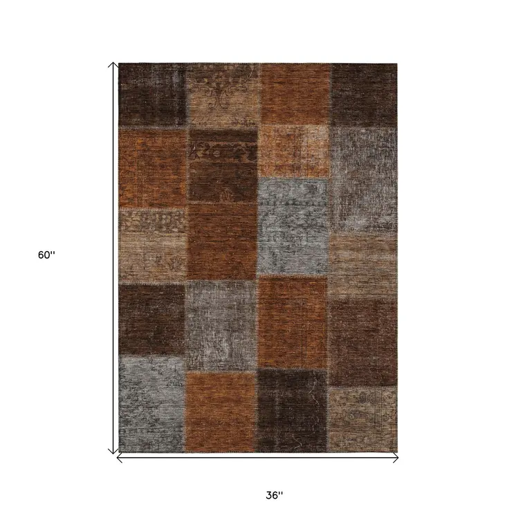 3' X 5' Orange And Taupe Patchwork Washable Indoor Outdoor Area Rug